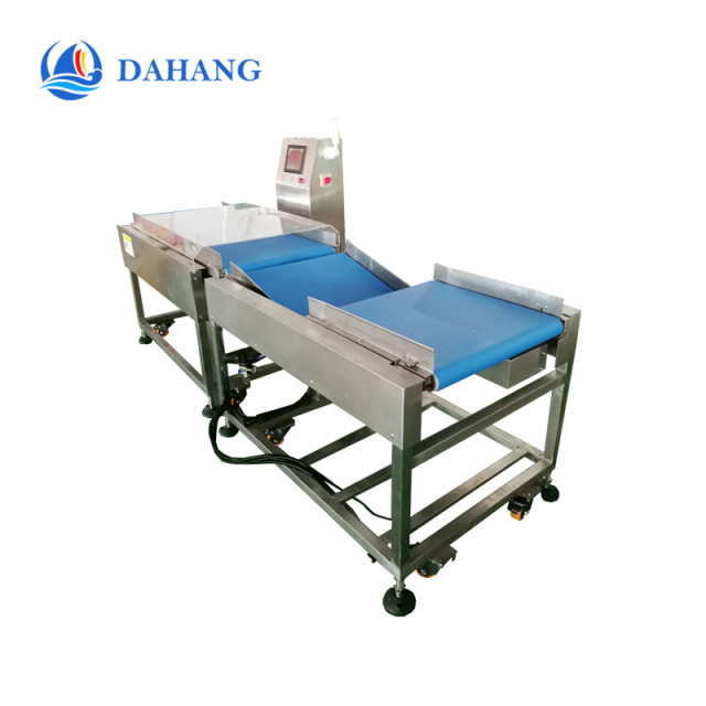 checkweigher with slide down rejector